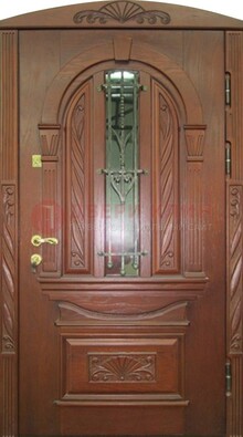 Узорная железная дверь массив со стеклом и ковкой ДСК-247 в Рязани