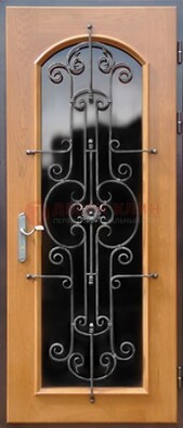 Морозостойкая дверь со стеклом темного цвета и ковкой ДСК-63 в Рязани
